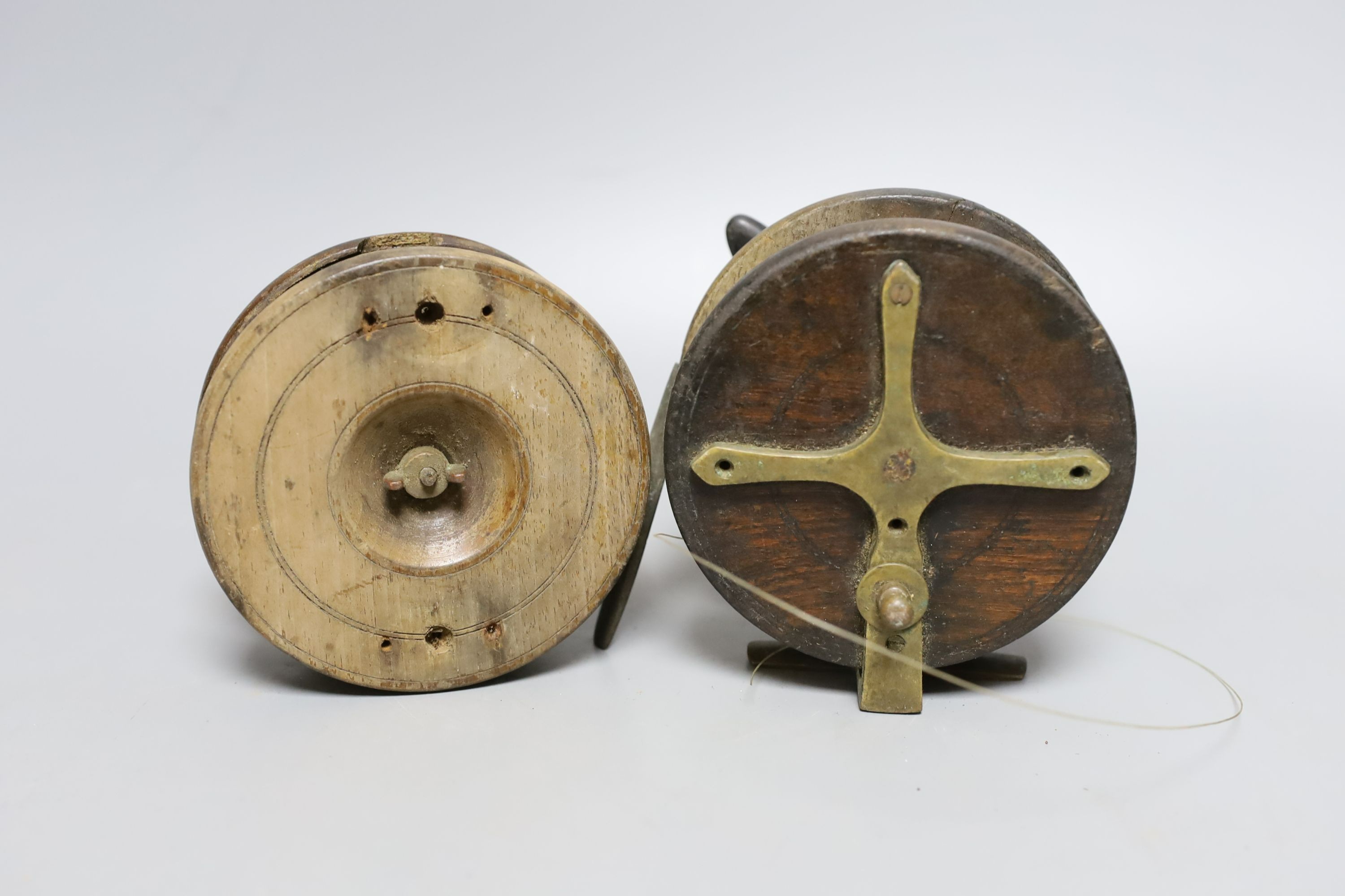 Vintage Ogden Smith fishing reel together with another